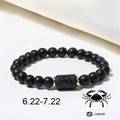 Close-up of matte black agate beads bracelet featuring a Cancer zodiac sign charm - Cancer (ZJ4599)