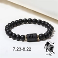 Detail of Leo zodiac black matte agate beads with gold spacers on elastic bracelet - Leo (ZJ4600)