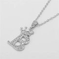 Macro detail of silver crown pendant with letter B encrusted in cubic zirconia - Crown Letter B / O-Chain / Silver