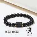 Detail of Libra zodiac bead bracelet with matte black onyx stones and gold spacers - Libra (ZJ4602)