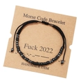 Handmade Morse code bracelet with black matte beads on a brown kraft display card - Fuck 2022 (ZJ6092)
