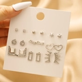 Set de 9 pares de pendientes plateados con estrellas, letras love y cristales - Estilo Plateado LOVE Corazón Pentagrama (ZJ12263)