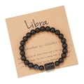 Detailed view of Libra zodiac bracelet with matte black beads and blue tiger eye stone - Libra (ZJ9625)