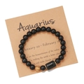 Aquarius zodiac bracelet with black matte beads and display card on white background - Aquarius (ZJ9629)