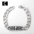 Detailed close-up of retro silver stainless steel Cuban chain bracelet with skull plaque - 18cm / Skull Matrix Style (C)