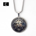 Macro detail of round stainless steel religious pendant featuring Jesus and embossing - Jesus Crucifixion Pendant With Chain / 50cm
