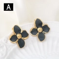 Elegant black enamel four-leaf flower stud earrings with gold plating on white silk - Black and Gold (A)