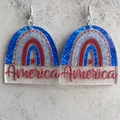 Detailed view of American flag inspired rainbow acrylic earrings with America text - Arch America Rainbow Style