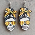 Skull earrings with messy bun and yellow baseball patterns on wood texture background - Wood Yellow Baseball Messy Bun Skull