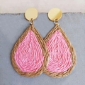 Pink bohemian woven raffia teardrop earrings with golden hooks on stone background - Pink (1)