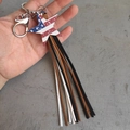 Star-shaped American flag keychain with long colorful tassels and a metal ring - Star Flag Style