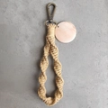 Detail of bohemian handmade woven keychain with beige rope and round wooden tag charm - Spiral Woven Style (With Wood Tag) / Natural Wood Color