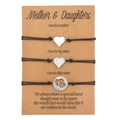 Three-piece stainless steel heart charm woven bracelet set on brown sentiment card - 3pcs Hollow Heart (ZJ7689)