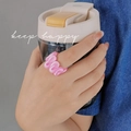 Pink and white wave pattern clay ring on hand for a trendy retro fashion look - Pink White Wavy Style(ZJ8114)
