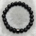 Black volcanic lava stone bead bracelet with a polished metal cylinder for men - Volcanic Rock Texture Style (ZJ9852)