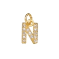 Macro detail of gold plated letter N pendant with micro-paved white cubic zirconia stones - Letter N / Gold
