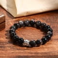 Detailed view of obsidian beaded bracelet with silver luster and carved beast charm - Mythical Beast Carving Style (ZJ10671 8mm)