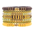 Detail of 7-piece bohemian stackable bracelets with heishi beads and gold metallic accents - Brown Gold White (ZJ11777)