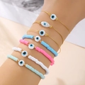 Set de pulseras bohemias de mal de ojo con brazaletes dorados y cuentas de arcilla - Juego de 7 Piezas Estilo Mal de Ojo Colorido (ZJ11982)