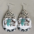 Detail of teardrop leather earrings featuring Just Pray text and leopard print patterns - Cross Leopard Cow Print (3)