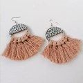 Detailed view of pink woven cotton tassels and leopard print accents on bohemian earrings - Lotus Pink (1)