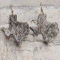 Close-up of cowhide Texas state earrings with hair-on leather and gold hooks - Natural Brown Horsehair Texture (3)