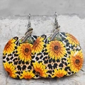 Detail of pumpkin leather earrings with sunflower and leopard print pattern on stone - Sunflower Leopard Pumpkin (1)