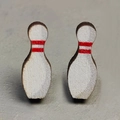 Detailed view of novelty wooden bowling pin stud earrings with red stripe accents - Bowling Pin Style (4)