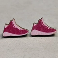 Close-up of pink wooden sneaker earrings with white polka dots and detailed wood grain texture - Pink Sneaker Style (5)