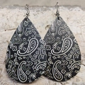 Macro view of teardrop leather earrings featuring black and white paisley floral patterns - Black White Paisley Teardrop (3)