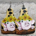 Detail of teardrop leather earrings with pink pig sunflower print and silver hooks - Piggy Sunflower Teardrop (4)