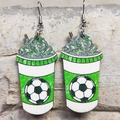 Detail of soccer ball cup dangles featuring green cream top and silver hooks - Soccer Cup Style
