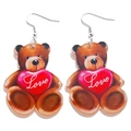 Detail of acrylic bear earrings with red hearts and Love lettering on white background - Teddy Bear Shape / Brown