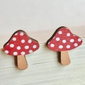 Close-up of handmade wooden mushroom earrings with red and white polka dot pattern - Red and White Polka Dot Mushroom (10)