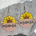 Detail of acrylic sunflower mama earrings with wooden half-circle on a stone surface - Sunflower Style (1)