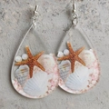 Macro detail of teardrop acrylic earring with starfish, shells and white pearls - Ocean Shell Style (5000809597262)