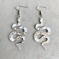 Floral snake-shaped acrylic earrings with celestial patterns and silver hooks - Translucent White