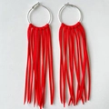 Detail shot of bohemian large silver hoops with layered bright red suede tassels - Red