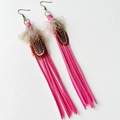 Detail of bohemian long feather earrings with pink suede tassels and bronze hooks - Peach Pink