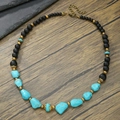 Beaded necklace with black matte beads, blue turquoise accents and bronze metal clasp - Bohemian Black with Turquoise Bronze Accessory Style (ZJ13768)