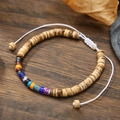 Detailed close-up of woven adjustable bracelet with colorful imperial stones and wood beads - Wood Beads With Mixed Color Beaded Bracelet (ZJ13085)