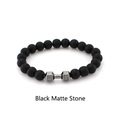 Close-up of black matte stone beads and silver dumbbell charm with Live Lift engraving - Single Matte Black Style (ZJ8926)