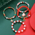 Detail of Christmas beaded bracelet set with Santa, tree, and wreath charms - Santa Tree Wreath Clay Pearl Set (ZJ13464)