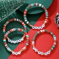 Close-up of Christmas charm bracelets with Merry Bright Joy letter beads and festive charms - Merry Bright Joy Letter Clay Set (ZJ13465)