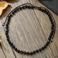 Verstellbare böhmische Obsidian-Kette mit goldenem Glanz auf rustikaler Holzoberfläche - Obsidian Golden Sheen Perlen Gewebte Seilkette (ZJ13512)