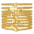 Set de 9 pulseras de cuentas doradas con colgantes de cruz, concha y corazón apilables - Estilo Combo de Colgantes Multitótem Dorados (ZJ13741)