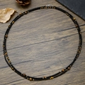 Bracciale elastico con perline occhio di tigre, onice nera e accenti in metallo oro - Occhio di Tigre Agata Nera Legno (ZJ13673)