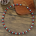 Collier tribal bohème avec perles en bois de coco multicolores et fermoir doré - Style Bohème en Pierre Synthétique Multicolore (ZJ14811)