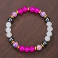 Boheems halfedelsteen kralenarmband met veelkleurige kralen op een houten achtergrond - Kleurrijke Keizersteen Mix (ZJ14098)