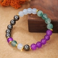 Multicolor natuurstenen kralenarmband met gouden tussenstukjes op hout - Paars Groen Wit Magnetiet Veelkleurige Stijl (ZJ14019)